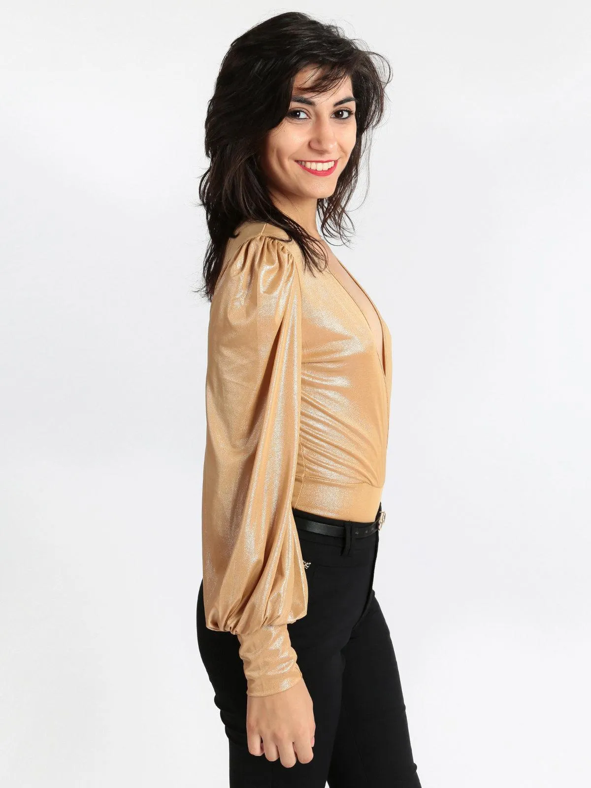 Jessy's stylish lamé bodysuit with puff sleeves.